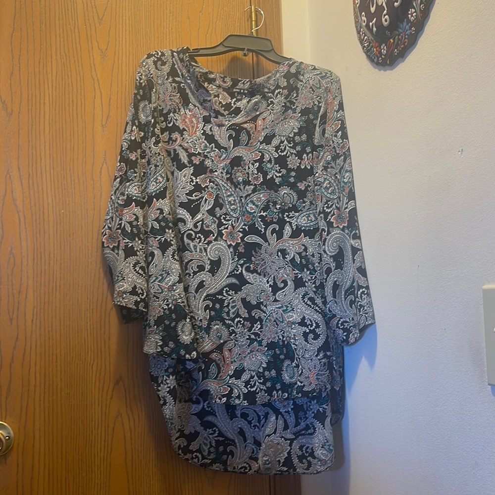Like new printed blouse. Selling for $10
